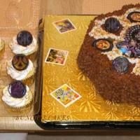 Tarron Loves Bakugan Bakugan cake using a flower cake pan design. Includes Bakugan cupcakes.