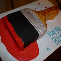 Paintbrush Made for a man who paints the interiors of homes. Everything fondant except the "paint" is royal icing.