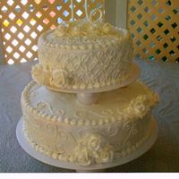 All White Sweet 16 All buttercream and royal icing. The 16 is made of royal icing and pearl candies.