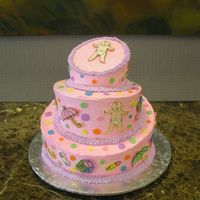 Whimsical Baby Shower Cake This cake was done whimsical style with candy melt pictures on the sides and top.