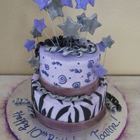 Purple "diva" Birthday Cake 8 inch and 6 inch round buttercream cake with fondant accents. Edible luster dust added.