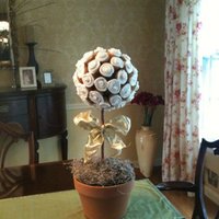 Cupcake Topiary About 60 mini cupcakes toothpicked into a styrofoam ball. Easy baking, tricky engineering to get it balanced after the cupcakes were iced...