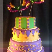 Mardi Gras Birthday Cake The mom picked out this cake for her daughter's 16th B-day. She brought a picture that was similar but in different colors. The bad...