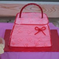 Purse Cake This one was supposed to look like a Louie Vuitton - with the initials of ML (Mike & Lana) for a bachelorette party. Not my favorite...
