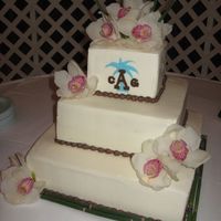 Img_0210.jpg iced in bc with fondant monogram, florist provided the bamboo at the base