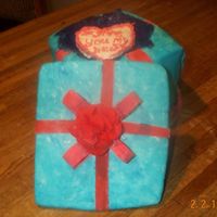 Gift Box Cake here is a view w/the top off revealing the heart in the box. The heart is also made out of strawberry cake.