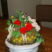 A Thank You Cake I made this cake for friends that had given me a birthday party. I'm not at all happy w/it. I can't arrange the flowers... its...