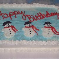Snowmen I took this cake to church for a potluck we had and the theme was birthdays. There were 12 different tables decorated for each month of the...