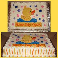Ducky Duck Baby Shower Cake 1/2 sheet white cake with strawberry filling and buttercream icingDesign matches party supplies