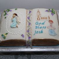 Joshs First Communion Made a mediera cake for a friends sons communion on the 24th May 2007all the art work was done in sugar.