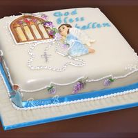 Kellens First Communion Picture On The 12Th May 2007 This cake is a medeira cake made for a childs communion on the 12th May 2007and all the assessories are made with sugar..