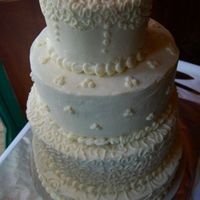 My 1St Stacked Cake I was very nervous about this one for my best friend. I was also a bridemaid, so I stacked the bottom two tiers and the top two tiers at...