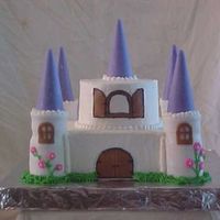 My First Castle Cake This cake was done for the county fair competition and is completely edible, the turrets are stacked cake round, cut out with a small glass...