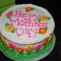 Mother's Day Chocolate cake, caramel pecan filling, buttercream dream icing.