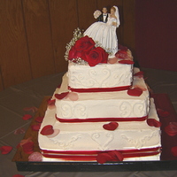 Amanda's Wedding Cake This was also a fun cake for my niece's wedding, the color scheme was red and white, Buttercream frosting, french vanilla cake, red...