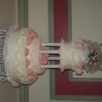 Nick And Val's Anniversary Cake Here is the anniversary cake, before the top tier took a dive....I need help with tiered cakes, The save is on this site in another picture...