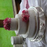 Buttercream Cake With Fondant Ribbon Border And Leaves. 