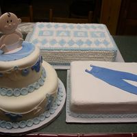 Baby Shower Cakes Cakes are White Almond Sour Cream Wedding Cake. Round Cake is covered with MMF and MMF decorations. My version of Wilton's Baby...