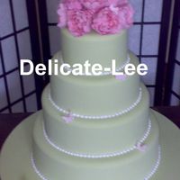 Peony Green This cake was for my first comp! The theme was a garden wedding. Icing pink peonies and butterflies.