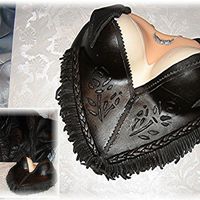 Motorcycle Jacket This cake was made for my mother-in-law who happens to be a harley chick. I borrowed the jacket idea from pyxxydust and used the lingerie...