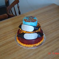 Naruto I made this NARUTO cake for my son's 12th Birthday. He wanted something different. Rainbow cake with MMF. The headbands were made...