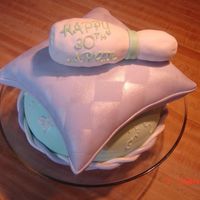 Bowling Princess This cake was mady for a friend who is a princess and loves to bowl. The bottom cake is carrot, Pillow is chocolate and the Pin is a rice...