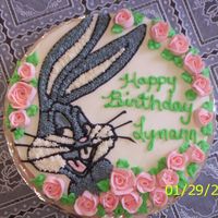 Bugs Bunny On A Bed Of Roses This birthday cake was inspired by my client wanting roses on the cake and her daughter (the birthday girl wanting Bugs Bunny) They both...