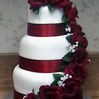 Practice Wedding Cake, 1St Time With Fondant I did this cake for practice for a wedding coming up in a couple of weeks. It was my first time with fondant. I used fake flowers for this...