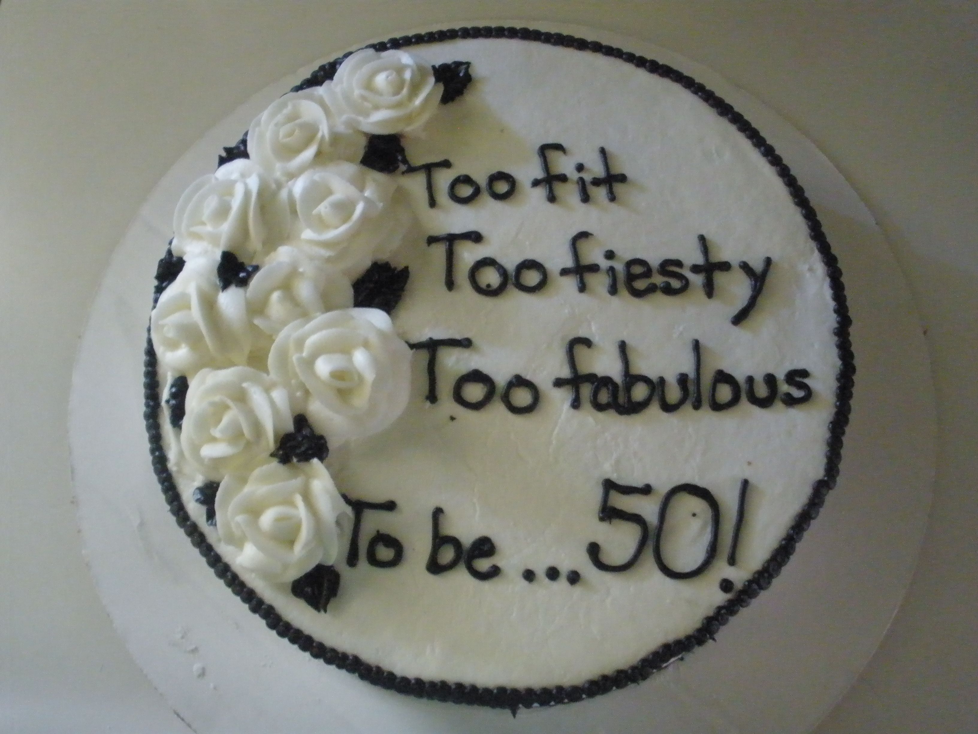 Black And White 50Th Birthday Cake vanilla cake with bc frosting. i think i got the inspiration from another cake on here. i forgot. thanks for looking. uhh i hav had so many...