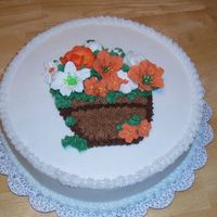 Pot Of Flowers iced with buttercream with royal flowers