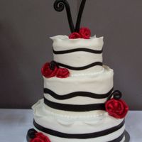 Black And White Affair This is actually a graduation cake for a "black and white" themed party. 12, 9, and 6 w/ glittered fondant roses! I got to design...