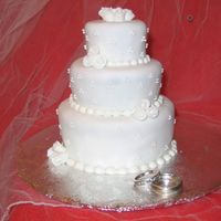 Miniature Wedding Cake I made this cake for my husband and I celebrating our second year of marriage. It is a miniature cake with 2", 3" and 4"...