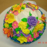 Wilton 2 Final Top view. Colorflow butterflies were a bit thin, but I was happy over all. Practice practice!