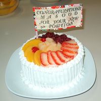 Fruit Cake 6" round cake with lots of fruit, three layer white cake with whipped cream and strawerries filling.