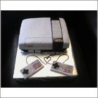 Nintendo Groom's Cake Groom's cake made for a big fan of the 80's, much like myself. This is the first cake I ever made, not counting the "draft...