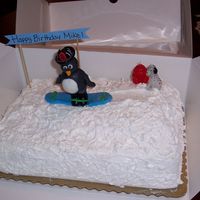 Snowboarding Penguin Cake I made this cake for my brother's birthday. He was going snowboarding the next week and since I had about 2 hours to bake and decorate...