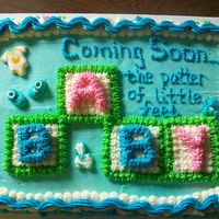 Pitter Patter Of Feet This is a 9 x 13" yellow cake with Extra Special Buttercream Frosting. This was based on a Wilton Yearbook design. Decorations are...