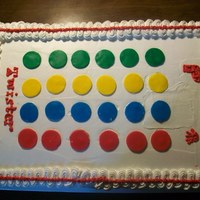 Twister This was a half sheet cake with Bettercreme Frosting and Fondant Cutouts. The cake was half yellow tih Bettercreme Filling and half...