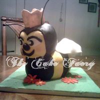 Lauren A cake for my brother's BBF birthday. They call her Queen Bee so he wanted a cake of a Bee w/a crown.White cake, covered in fondant, &...