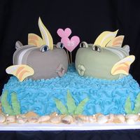 Anniversary Fish I got the inspiration for this cake from islandije's valentine cake. This was for a 25th anniversary. The fish are 2 8" round...