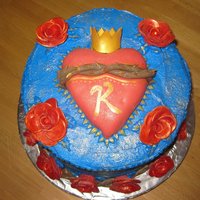 Karena's Sacred Heart frosted in Buttercream, fondant branches with thorns, heart is rtk covered in fondant...we used gold dust luster to accent leaves, trim on...