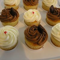 Christmas Cupcakes Just a selection of cupcakes I did for a Christmas get together. White cake with buttercream and chocolate buttercream. They are simple but...