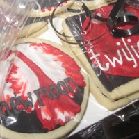 Twilight And New Moon Cookies I forgot to take a pic before I wrapped them. Boy that New Moon flower was a challenge!