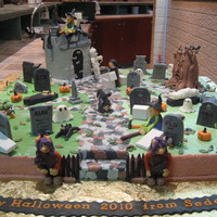 Halloween Graveyard 6 13x9 vanilla cakes spliced together for a Halloween ball for 250 people. We had a problem getting it out of the house! Debbie Brown...