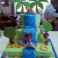 Dora The Explorer This cake took forever, but I was so happy with the way it turned out. Marshmallow fondant "rocks", gumpaste bridge and ladder,...