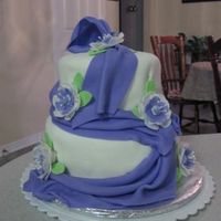 Elegant Fondant Class This is my cake for the wilton elegant fondant class. It was a lot of fun to decorate.