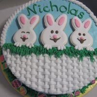 Easter Birthday Cake An easter themed birthday cake for my 5 year old cousin whose birthday was on Easter weekend. Bunnies are rolled cookies with royal icing....