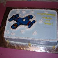 Baby Shower Nursery theme will be airplanes. Vanilla cake with strawberry filling and Frostin Pride with transfer of airplane.