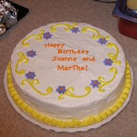 Boss's Birthday Cake butter cake with half pineapple filling and half strawberry filling with cream cheese frosting. simple decorations. first time trying...