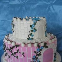 Princess Castle Cake I just took a picture without princess cake toppers. I will post a picture with princesses soon.I hope this cake looks like a castle....